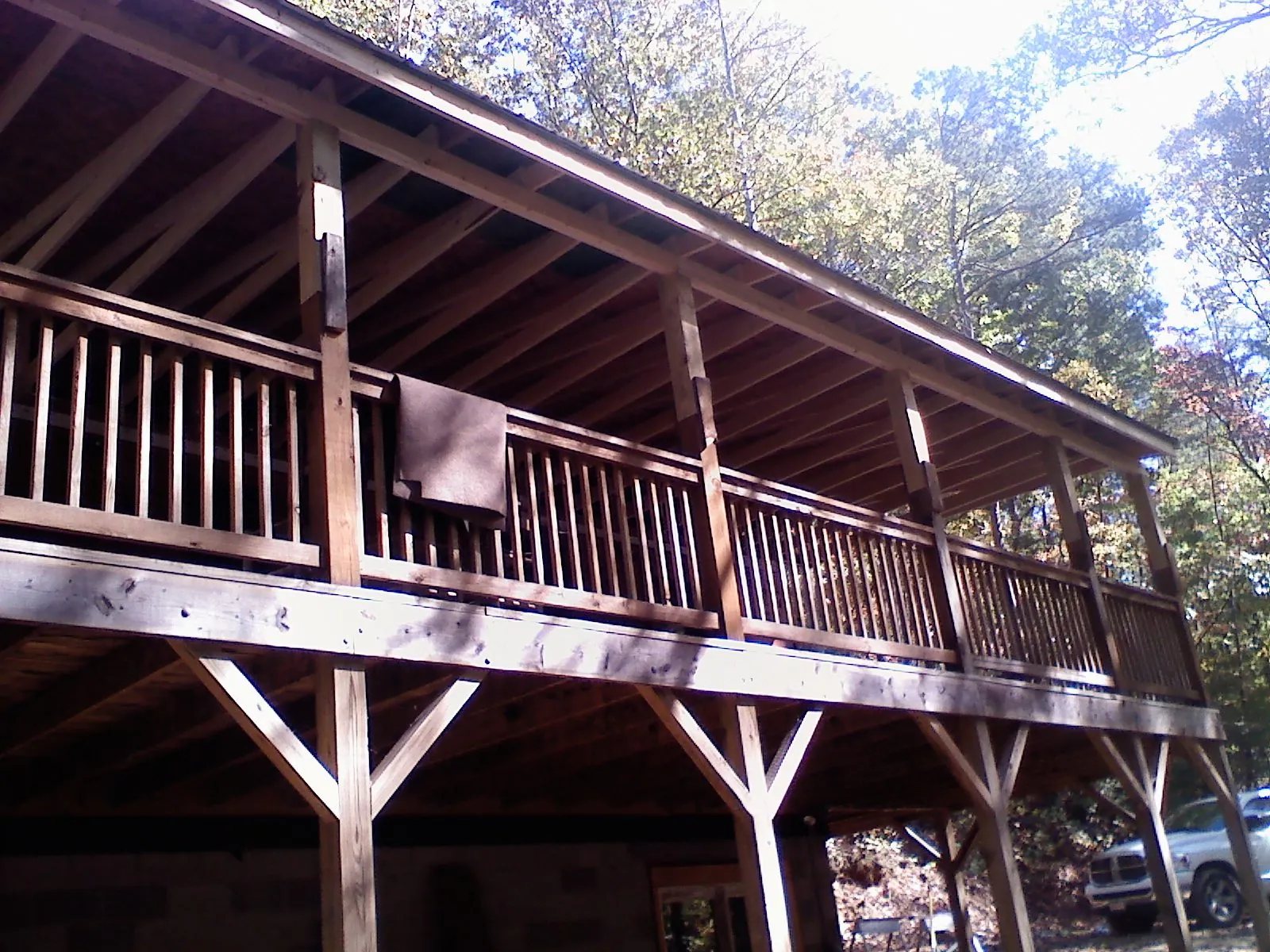 Timber framing under a new elevated porch and deck — Roof Leak Repair in Charlemont by Roofing Brothers
